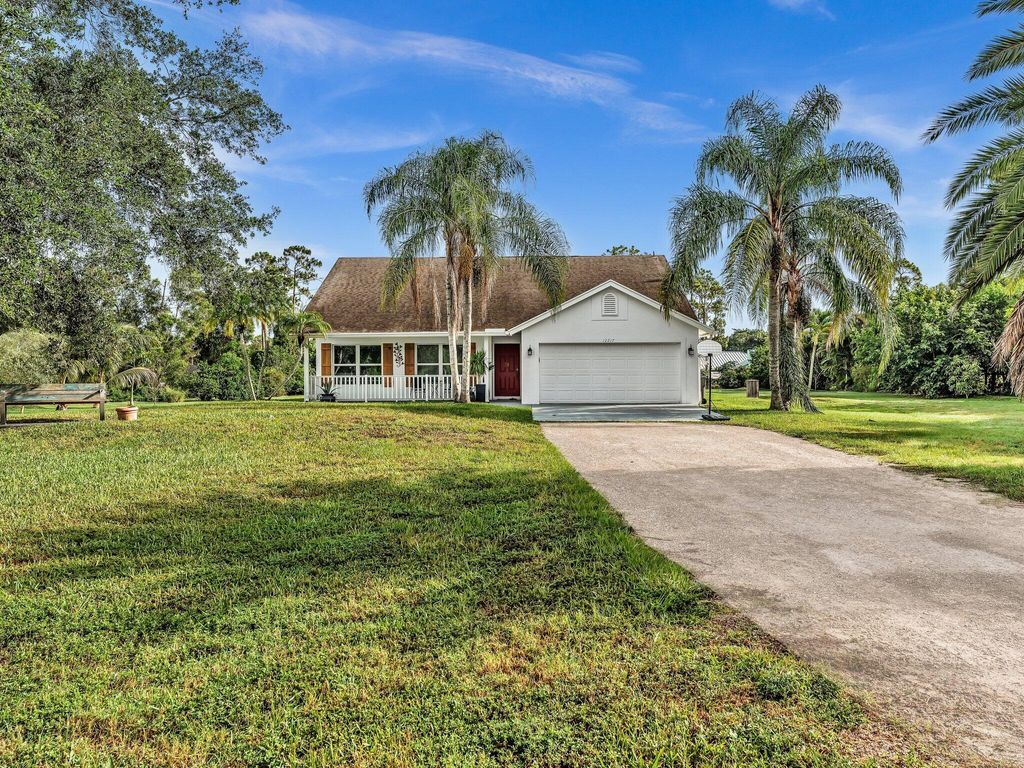 Photo of 12217 152nd Street N, Jupiter, FL 33478 (MLS # R11125592)