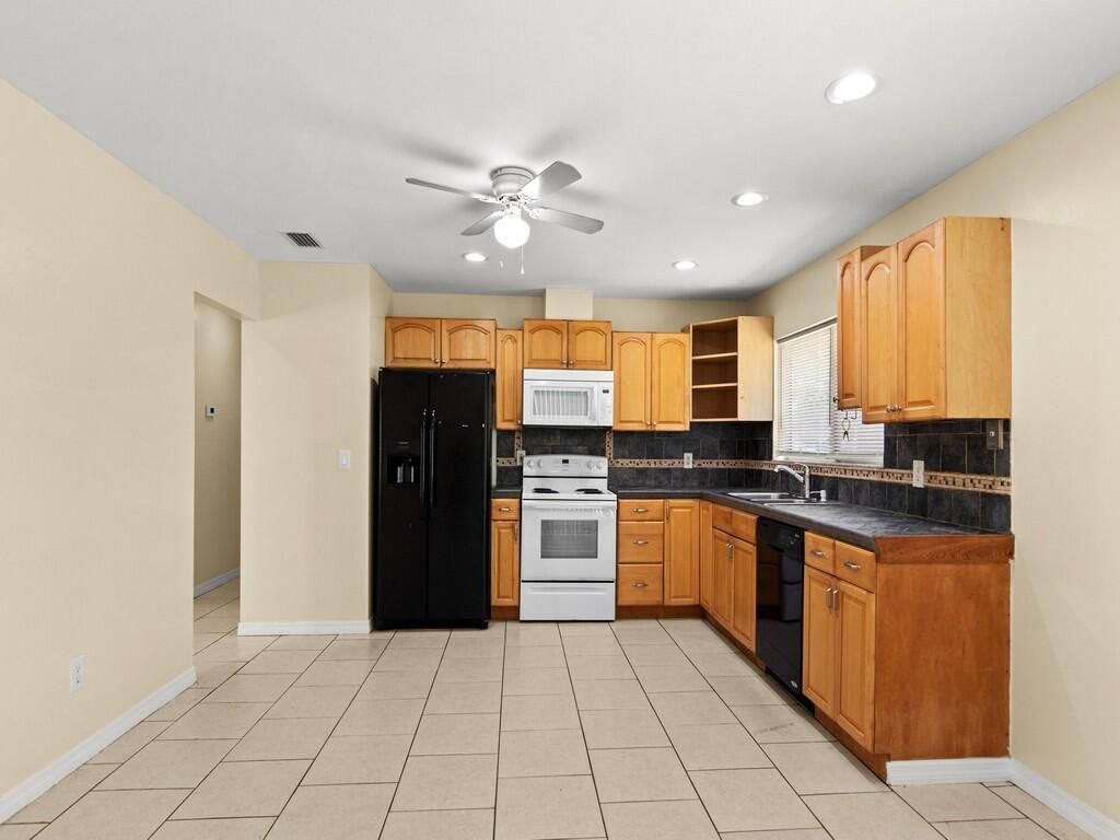 Photo of 254 SW Bridgeport Drive, Port Saint Lucie, FL 34953 (MLS # R10979285)