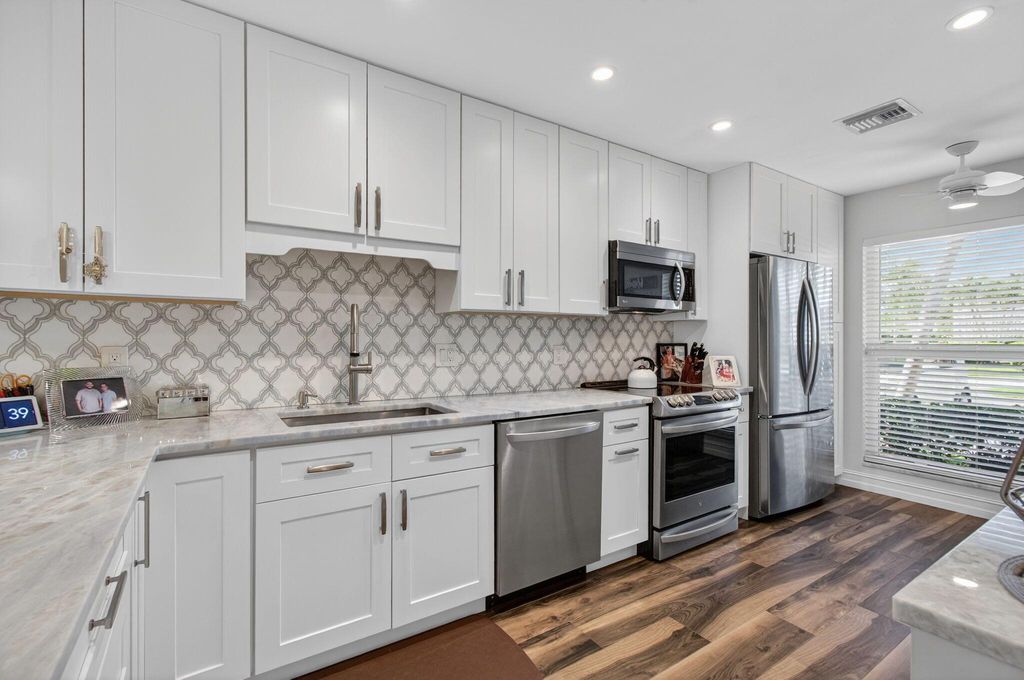 Photo of 2511 Black Olive Boulevard #41-C, Delray Beach, FL 33445 (MLS # R11105496)