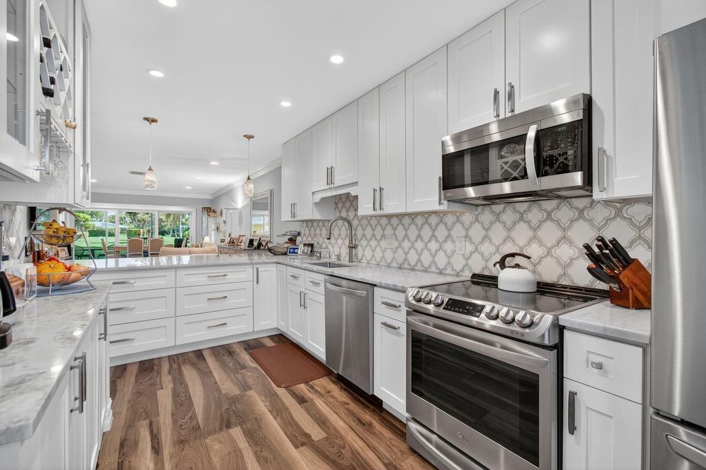 Photo of 2511 Black Olive Boulevard #41-C, Delray Beach, FL 33445 (MLS # R11105496)