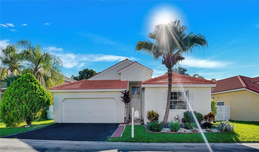 This cozy home is nestled in the gated community of Bermuda Springs, with a low cost HOA (only $335per quarter). A-Rated Weston School District just behind Indian Trace Elementary. Relax on the back patio or by the private community pool. Enjoy an open floor concept in the living/dining area with vaulted ceilings. NEW ROOF 2023. Split floor plan provides private space for each family member with a Master Bedroom on-suite. Location convenient to any/everything you need.