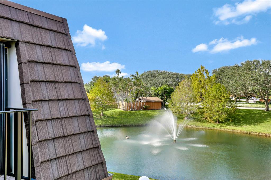 Great Location in desirable Lakes at the Bluffs near beach and marina! Very clean 2 BR 2.1 BA townhouse, move-in ready unit, built by Divosta, beautiful lake views (only 5% of the town homes have water view), private fenced courtyard with landscape lighting, full size washer/dryer, newer carpet, storage, central vac, two assigned parking spaces. Offered for annual lease. Small pet under 25 lbs is welcome. No commercial trucks! Must See!