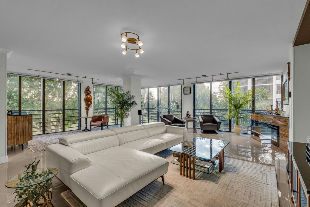 Photo of 7572 Regency Lake Drive #402, Boca Raton, FL 33433 (MLS # R11052890)