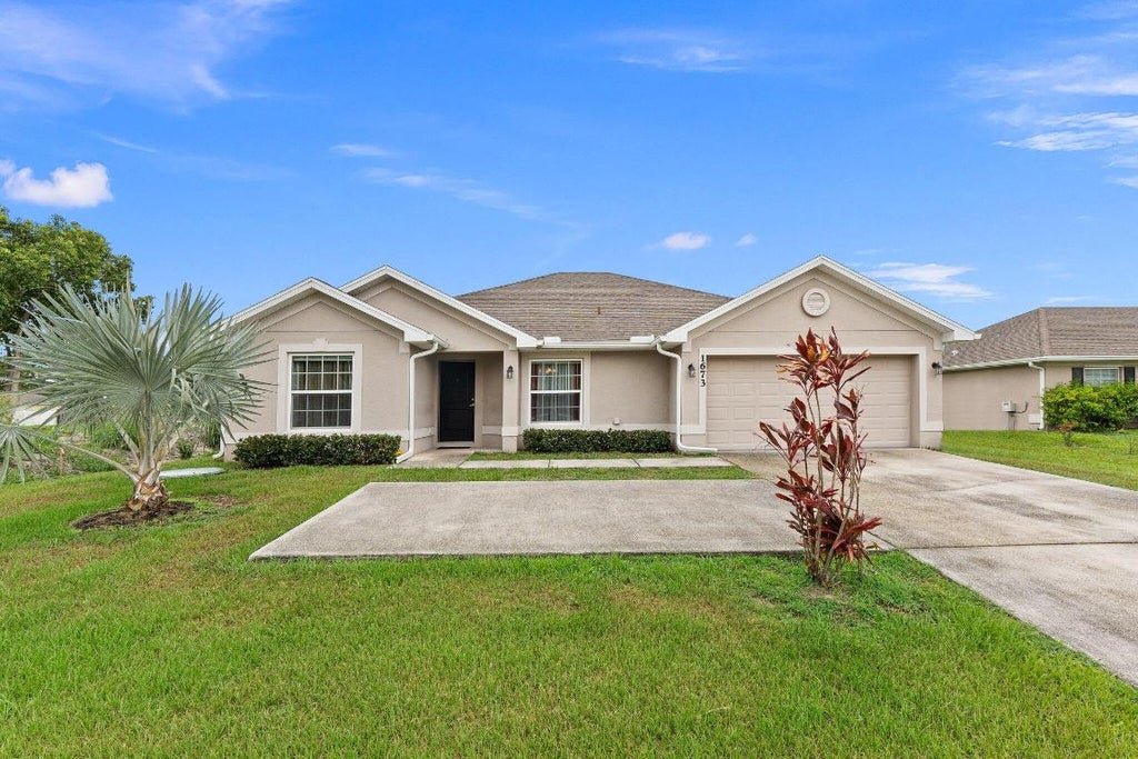 Photo of 1673 SE Airoso Boulevard, Port Saint Lucie, FL 34984 (MLS # R10997185)