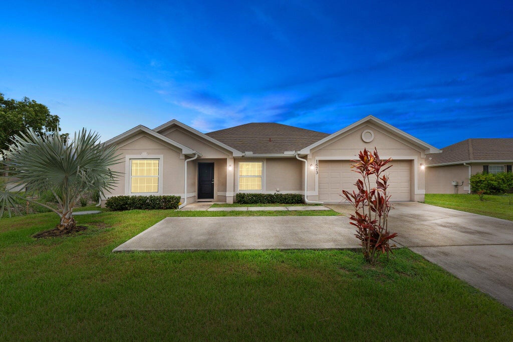 Photo of 1673 SE Airoso Boulevard, Port Saint Lucie, FL 34984 (MLS # R10997185)