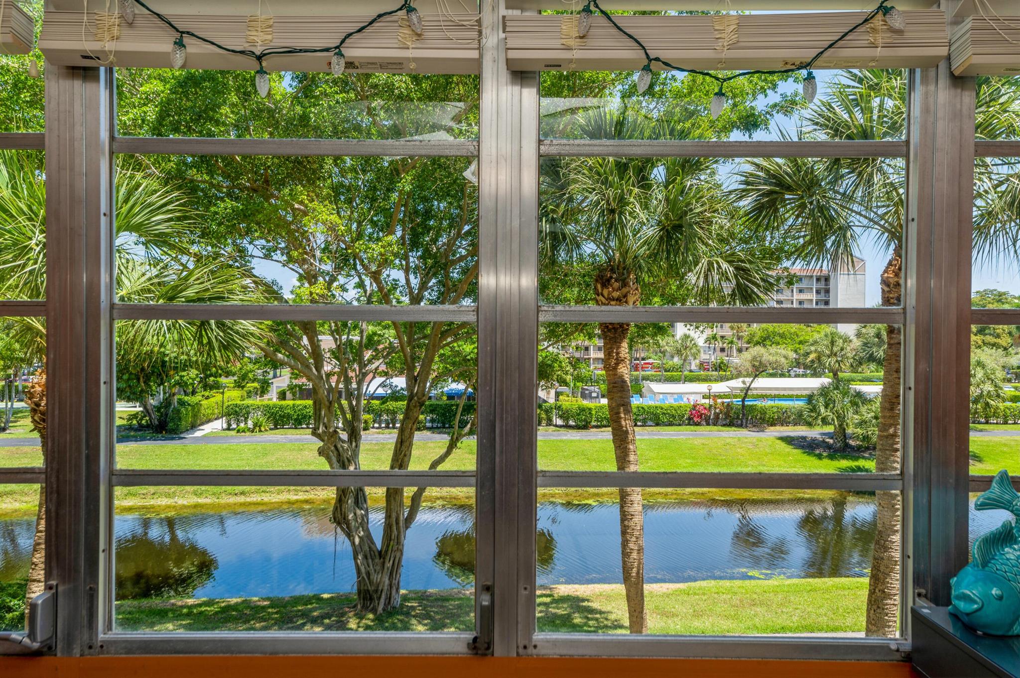 Beautiful 3rd fl. condo overlooking peaceful water view and pool in desirable Bonaire Village. Updated kitchen with granite counters, stainless Frigidaire appliances, soft close cabinets. A/C 2023, upgraded plank flooring in bedrooms with built-in cabinets in primary closet. Unit has W/D and fans throughout. Enjoy this 55+ community with amenities including heated pool, fitness center, billiards, library, auditorium for social events. Paved walking paths that wind around tranquil water views. Conveniently located between I-95 & turnpike. Close to places of worship, shopping, fine restaurants, theaters minutes from Delray Mkt. Place. Just 15 minutes from beach, Famous Atlantic Ave sidewalk Cafes, exceptional WaterFront Dining. Live music, happy hours.