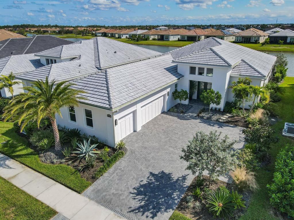 Photo of 8681 SW Flutto Way, Port Saint Lucie, FL 34987 (MLS # R10848249)