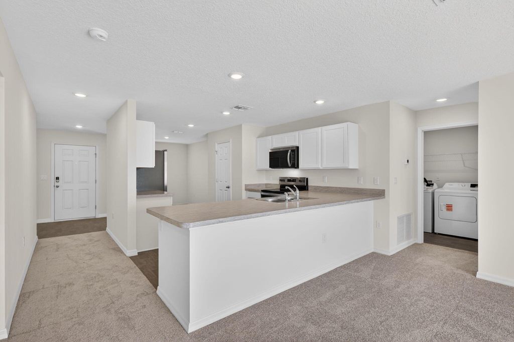 Photo of 2121 SE Mandrake Circle, Port Saint Lucie, FL 34952 (MLS # R11155594)