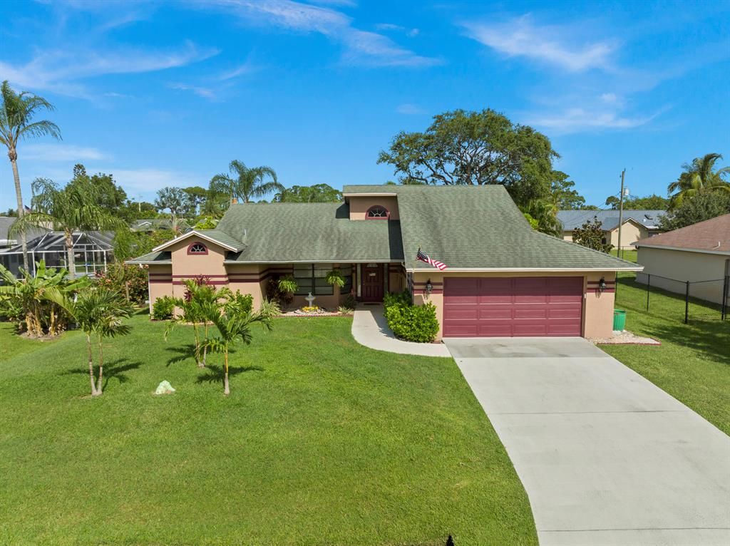 Photo of 1692 SE Pleasantview Street St, Port St Lucie, FL 34983 (MLS # R10815347)