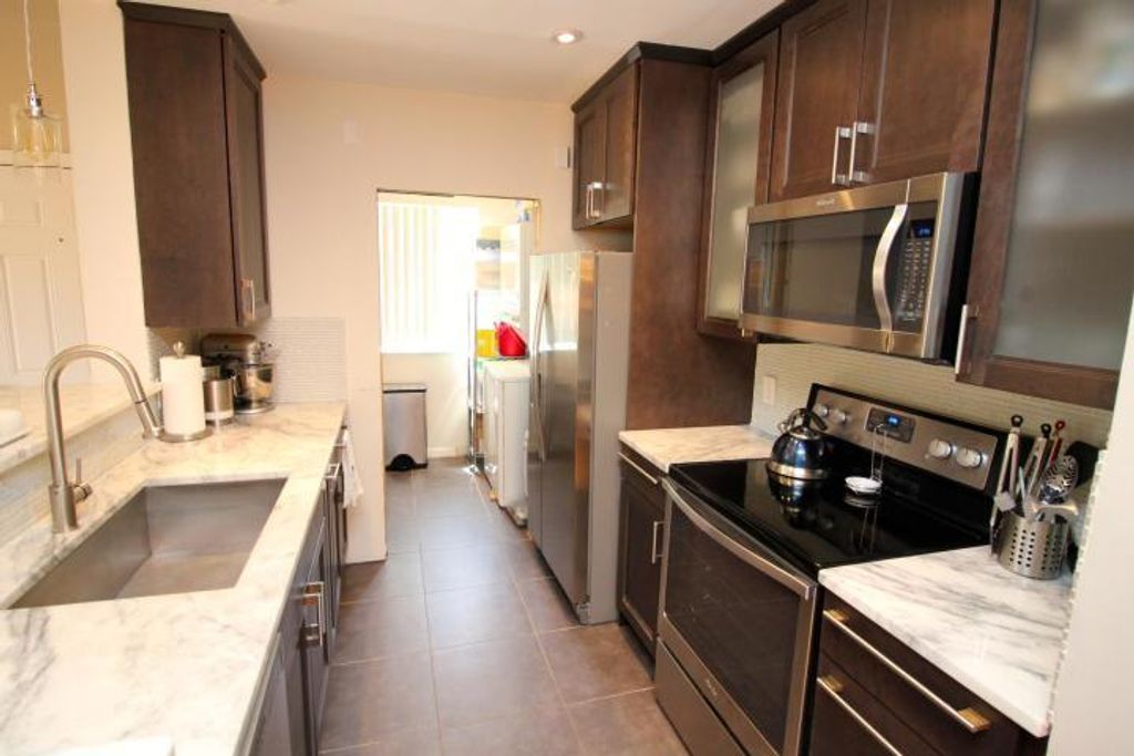Photo of 157 Yacht Club Way #201 Corner, Hypoluxo, FL 33462 (MLS # R11147509)