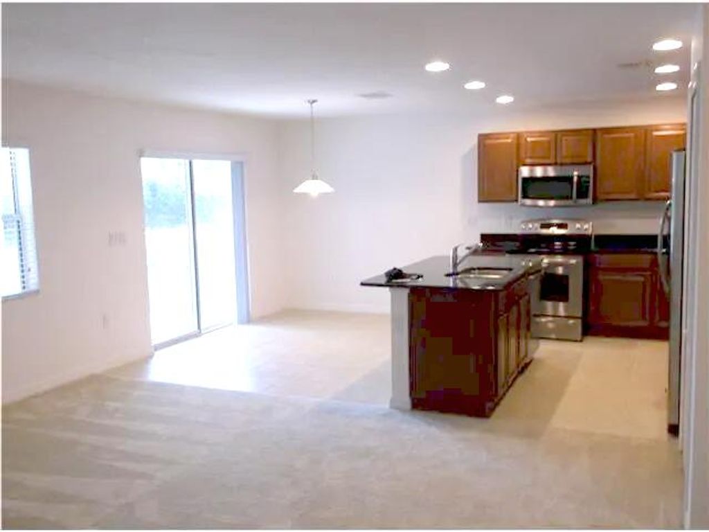 Photo of 386 Lexington Avenue SW, Vero Beach, FL 32962 (MLS # B26028977)