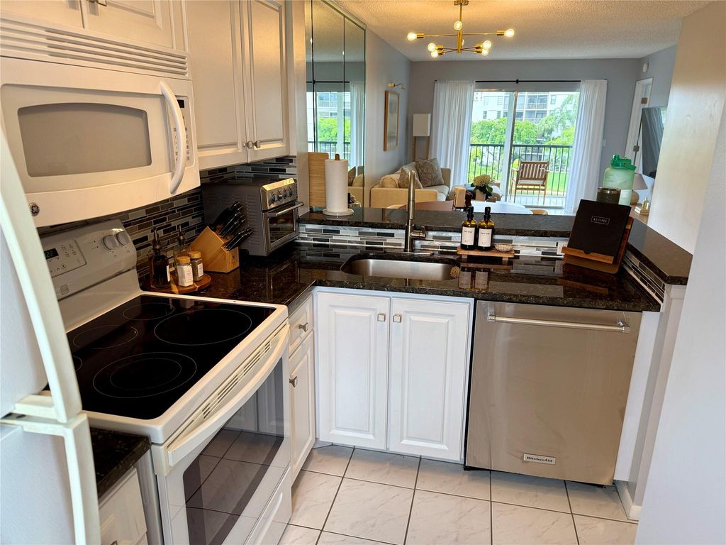 Photo of 2222 N Cypress Bend Drive #408, Pompano Beach, FL 33069 (MLS # F10507444)