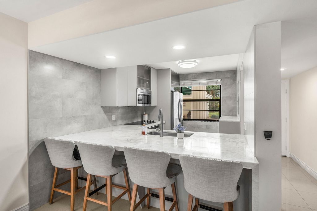 Photo of 6049 Balboa Circle #103, Boca Raton, FL 33433 (MLS # R11161980)