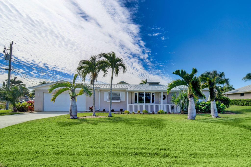 Photo of 37 SW Riverway Boulevard, Palm City, FL 34990 (MLS # R10952558)