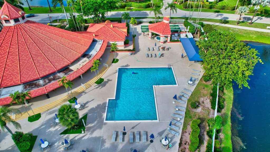 Photo of 7844 Lexington Club Boulevard #C, Delray Beach, FL 33446 (MLS # R11145244)