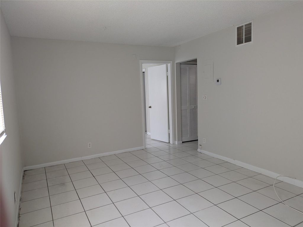 Photo of 4133 NW 88th Avenue #101, Coral Springs, FL 33065 (MLS # F10528243)