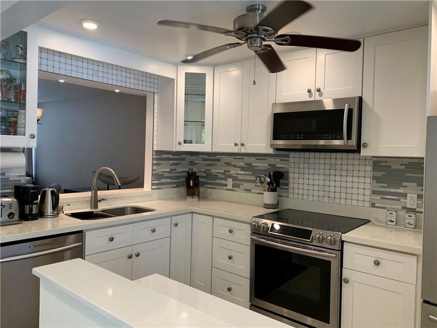 Price to sell! Renovated corner 2 bedroom 2 bathroom specious unit with beautiful garden view! Partially furnished. Hurricane impact windows in every room with additional accordion shatters, tile floor in living area, wood floor in both bedrooms. Gated community. Basic TV cable and internet are included in maintenance. Amenities include BBQ and Tiki bar area, 2 pools, hot tab, sauna, gym, pool table, library, courtesy bus. Close to everything: shopping plazas, banks, restaurants, great city park of Pompano, award winning golf course, LA fitness etc. Only 1 mile from the beach. 1 assigned parking space and min credit score 700 as per condo association requirement. Rent after 2 years of ownership.