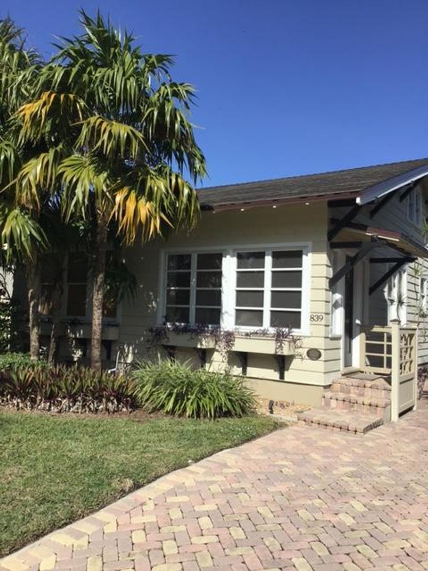 Historic Flamingo Park ''Key West'' style house and cottage.  Home is a 2 bedroom with one bath and cottage is a legal rental 1 bedroom with bath.  The home has an unusual second half story which provides super storage.  Can be used as an office. 
Second floor has impact windows  Cottage is fully renovated with impact windows. Beautiful pool with salt chlorination. Tropical yard.  Home has a working fireplace with ash dump.  New roof from 2020 on house and cottage - fully strapped and nailed.  New A/C unit.  New wiring.  Newer refrigerator, stack washer and dryer.