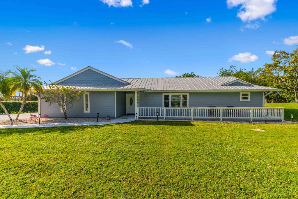 Photo of 3560 SW Racquet Club Way, Palm City, FL 34990 (MLS # R10970363)