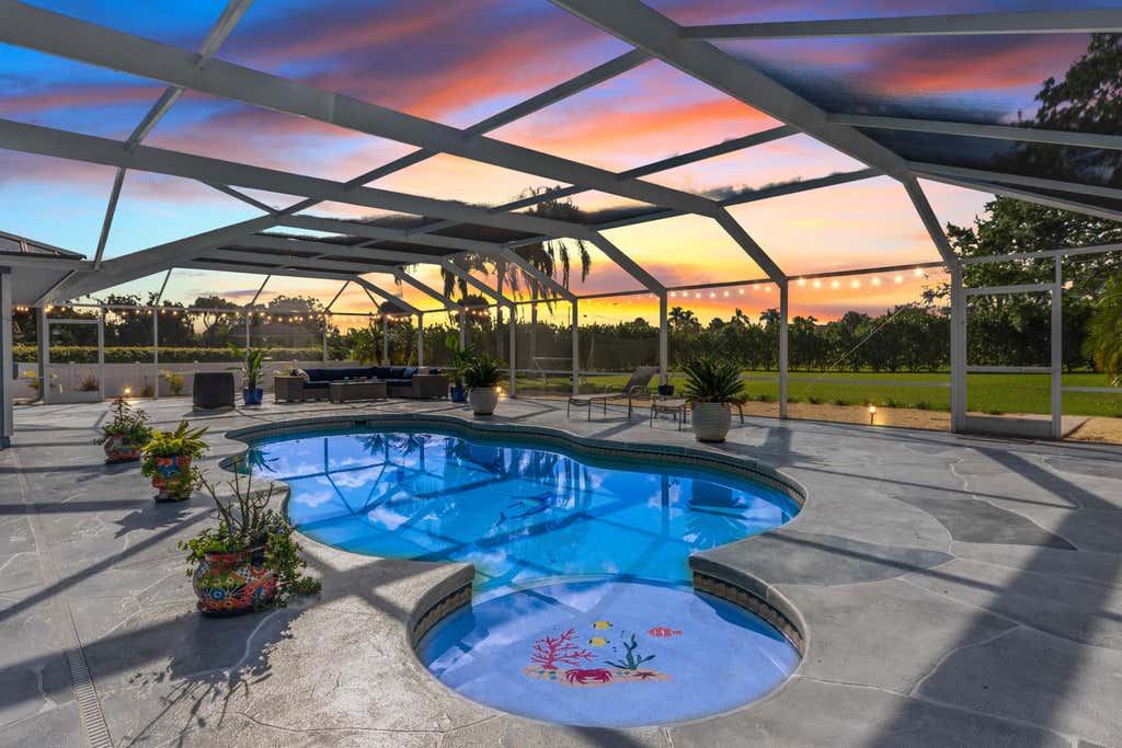 Photo of 3560 SW Racquet Club Way, Palm City, FL 34990 (MLS # R10970363)