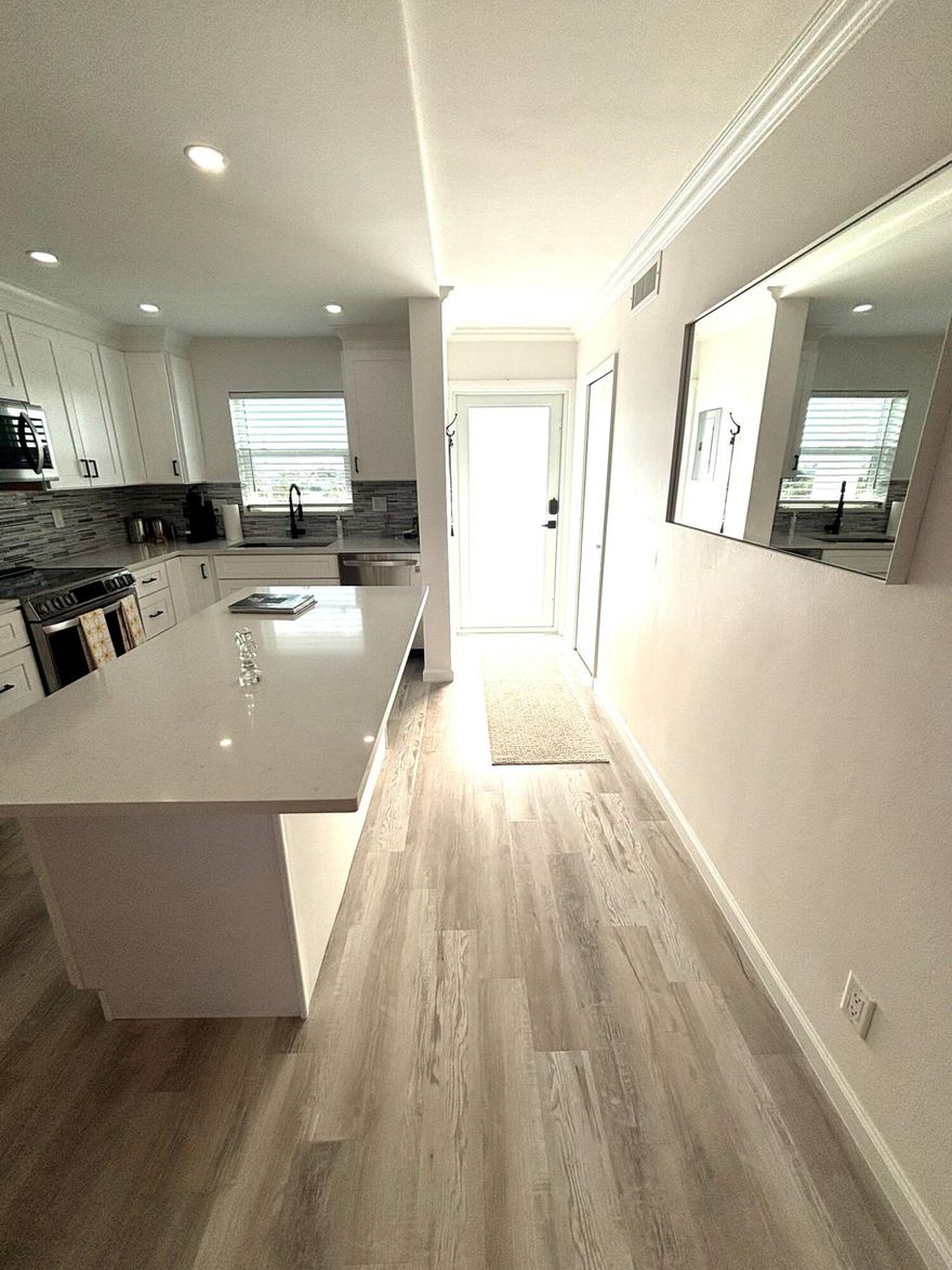 Very rare unit available in the highly desirable Coastal Terrace. This condo is fully updated with quartz countertops, shaker cabinets, and stainless steel appliances. Full hurricane impact windows, doors, and sliders. Main bedroom boasts built-in cabinets and a California closet. New air conditioning and hot water tank.  Great 180 degree views of the Intracoastal across from Deerfield Island Park. There is one deeded covered parking space with 18 guest spaces available for your company. Very short walk of two blocks to the beach, pier, shops, and restaurants. Building has completed the 40 year inspection, a brand new roof, the reserve study, and has a fully funded reserve. The listing broker is also the building President so call with any questions.