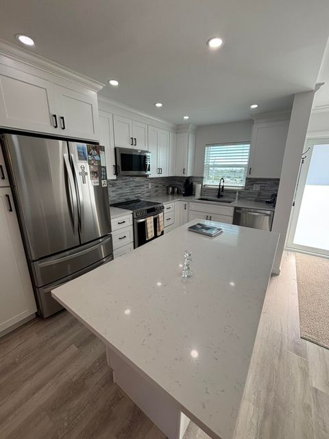 Photo of 401 NE 19th Ave #53, Deerfield Beach, FL 33441 (MLS # B26000186)