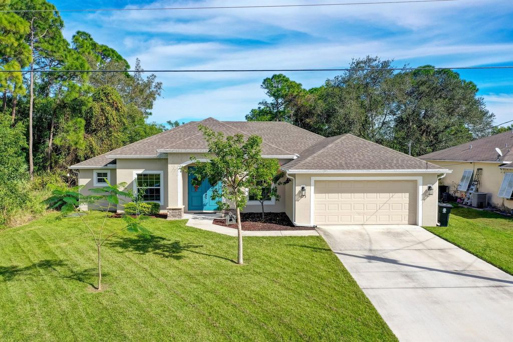 Photo of 1373 SE Proctor Lane, Port Saint Lucie, FL 34983 (MLS # R10942782)
