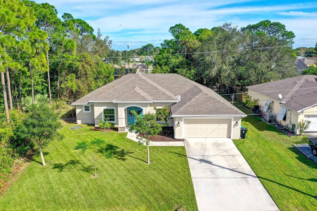 Photo of 1373 SE Proctor Lane, Port Saint Lucie, FL 34983 (MLS # R10942782)