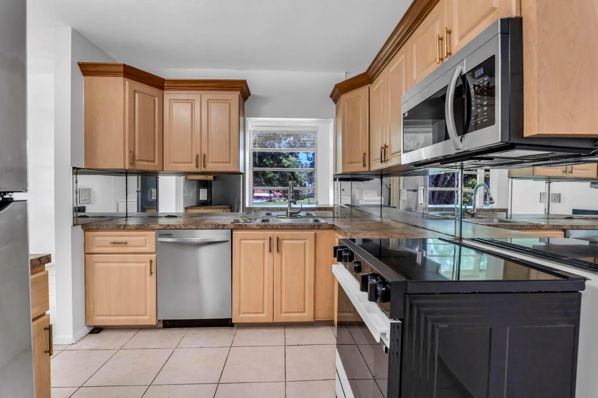 Beautiful light & bright 2bd/2ba very spacious condo on the top floor ( no one above you ) in Abbey Villages of Oriole, an active 55+ community in the heart of Delray Beach. Unit features tile throughout, Brand New SS Appliances, Brand New Full Size Washer & Dryer, freshly painted, No Popcorn Ceilings, enclosed patio for more living space, plenty of storage. AC 2015 & WT 2019. New Upgraded Electrical Outlets & Receptacles. New Light Fixtures & Fans. The community offers many amenities including pools, fitness center, card room, library, large auditorium for meetings, shows & entertainment, walking paths. Close to the beach, shopping, pharmacies, medical facilities, dining & entertaining. HOA includes Water/sewer, Trash, basic cable & internet. HOA requires a minimum 700 credit score.