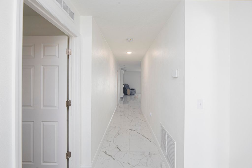 Photo of 228 SE Sims Circle, Port Saint Lucie, FL 34984 (MLS # B26014563)