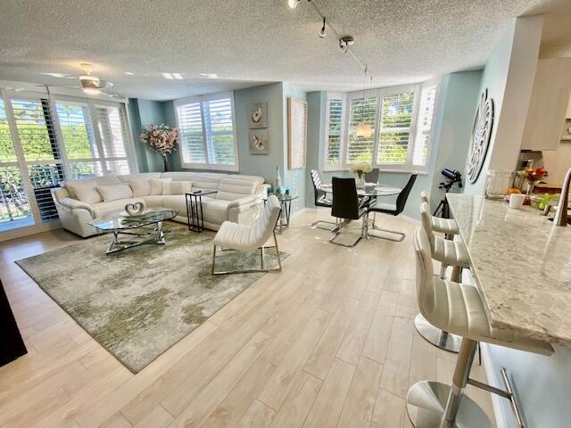 Beautiful 3/2 open floor plan, SE corner unit. Gated resort community on intracoastal, across from beach w/private beach access. Master king, steam shower, bidet, walk in closet. Two guest king & queen, walk in tub/shower. Reclining sofa. Active community w/fun events. Heated pool, Jacuzzi, bbq area, pizza oven, TV, Clubhouse, Gym, Sauna, Steam Room, Business Center, Tennis/Pickleball. Pier extends into intracoastal. Highland Beach Library, Police Dept, Fire Station Adjacent. Walk/Bike Path miles along A1A. Minutes from trendy Delray Beach & Boca Raton. Assigned parking & plenty guest parking. Fall in love with your home away from home. Available April 1, 2025 off season $4,500 month, next season 11/1/25 -4/30/26 $12k month, will consider Annual. Water, Cable, Wifi included. ESA ok.