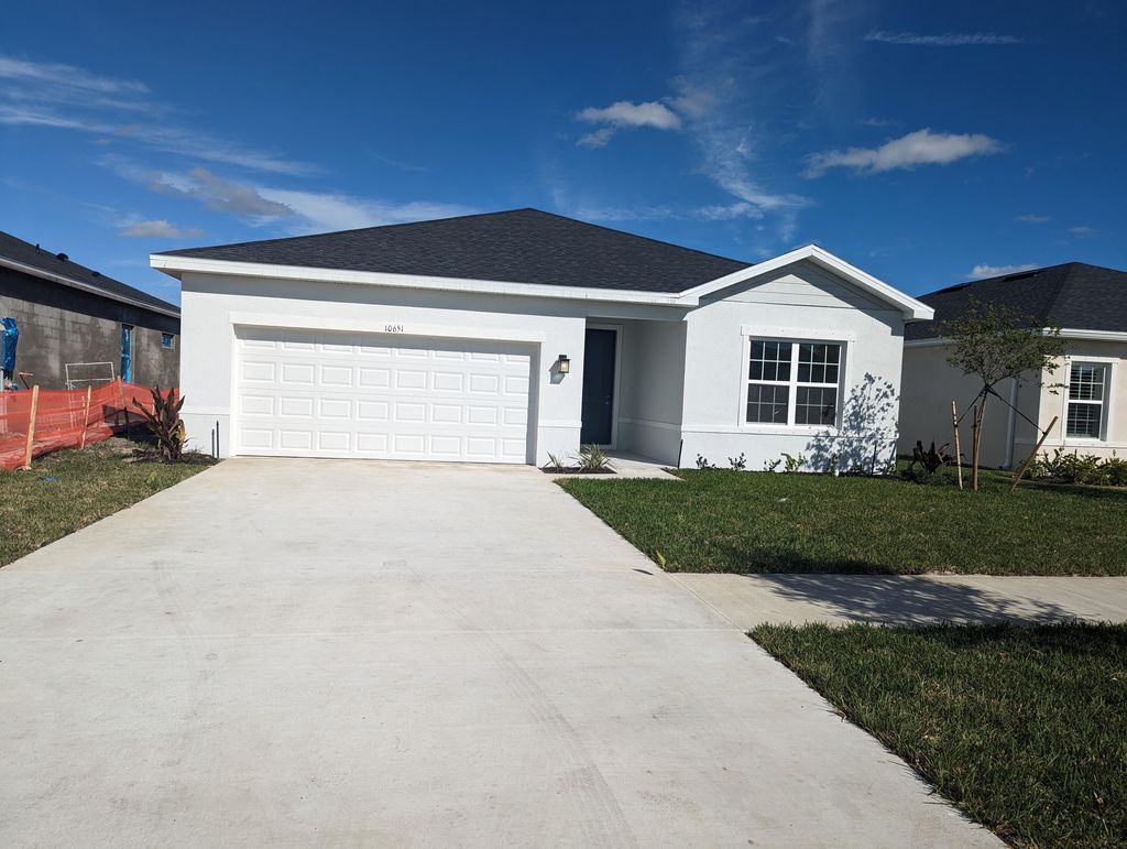 Photo of 10651 SW Vasari Way, Port Saint Lucie, FL 34987 (MLS # R10857624)