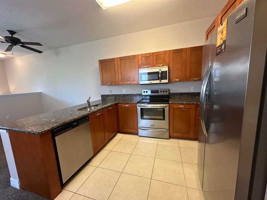Photo of 49 SE Sedona Circle #202, Stuart, FL 34994 (MLS # R11089012)
