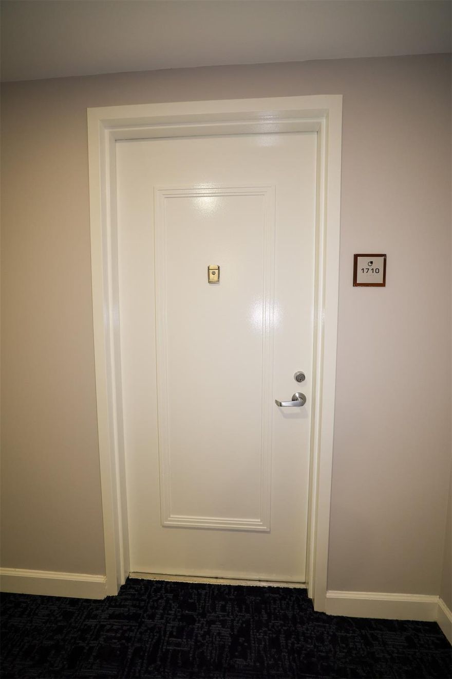Beautiful well-kept and spacious two bedroom, two bath and den, condominium in Metropolis at Dadeland.  This unit features marble floors and bathrooms, and a large galley-style kitchen with granite countertops. At 1,467 square feet, the unit has a bonus den enclosed by sliding french-doors, and a closet; useful as an office or even junior third bedroom. Building has secured entry with 24-hour security and front desk staff. Guests can park their vehicles with Valet, and the unit has one assigned parking space and one valet parking space at no charge--total two vehicles permitted. Designated parking space is spacious and has substantial space between cars. CONDO HAS RESERVES. Furniture is from West Elm, customized, and is negotiable should buyer wish to purchase furnished. Furniture sold separately and will be professionally steam cleaned.