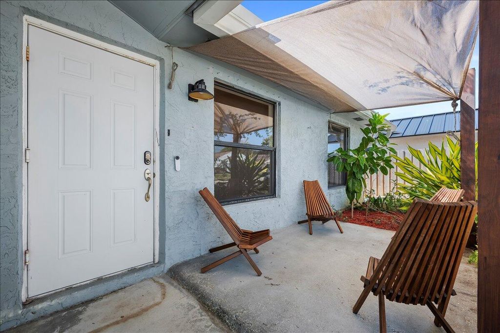 Photo of 5962 SE Wilsie Drive, Stuart, FL 34997 (MLS # B26015755)