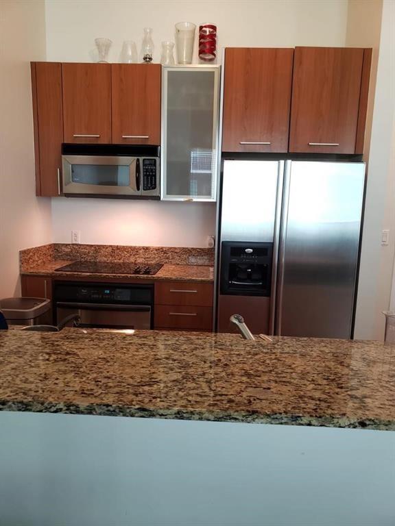 Stylish Loft-Style 2BD/1BA Apartment at Metropolis at Dadeland! This alluring unit features elegant marble floors, sleek stainless steel appliances, and granite countertops, offering a modern and sophisticated living space. Enjoy resort-style amenities including a pool, sauna, fitness center, and concierge services. Located in the heart of Dadeland, this residence combines comfort, convenience, and upscale living.