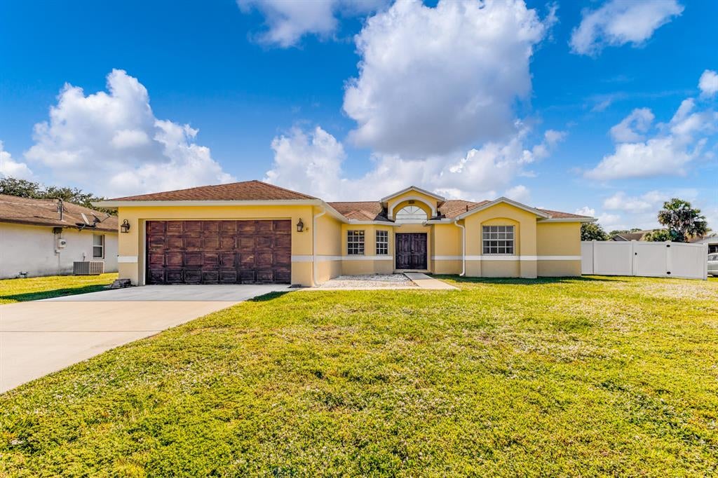 Photo of 932 SW Mccall Road, Port Saint Lucie, FL 34953 (MLS # R10759316)