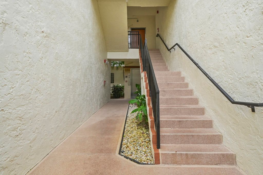 Photo of 5155 Europa Drive #J, Boynton Beach, FL 33437 (MLS # B26019665)