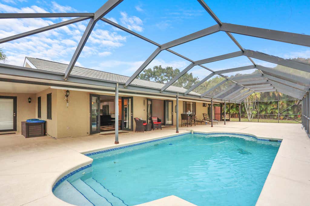 Photo of 3060 SE Darien Road, Port Saint Lucie, FL 34952 (MLS # R11149870)