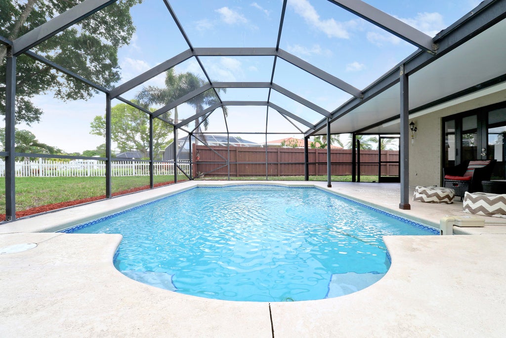Photo of 3060 SE Darien Road, Port Saint Lucie, FL 34952 (MLS # R11149870)