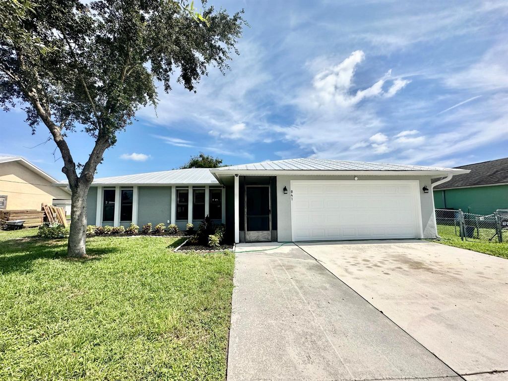 Photo of 841 SE Cavern Avenue, Port St Lucie, FL 34983 (MLS # R10908251)