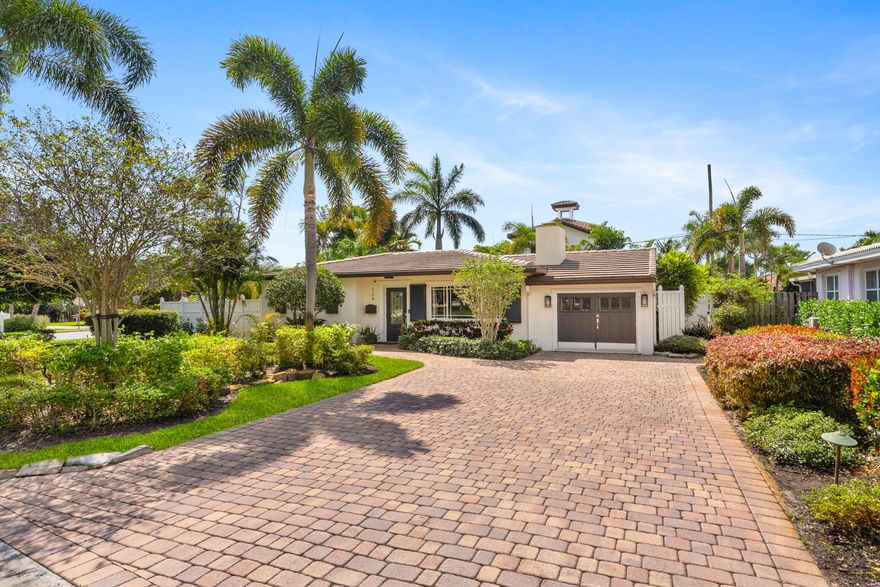 124 Bonnie Briar Lane is the perfect blend of coastal contemporary living intertwined with old Florida charm.  Located within less than a mile to Delray Beach's famed Atlantic Avenue and within close proximity to the Atlantic Ocean, this home is ideal for anyone wanting to take advantage of all the perks associated with East Delray living.  A brand new roof, impact windows and sliders, city gas line powering your dryer, fire place, brand new whole home generator, water heater and pool heater are all components making this home stress free for its new owner.  With an idyllic split floor plan, the home centers around your open concept kitchen with two guest bedrooms on the East portion of the home and the primary suite on the West end of the property.   The garage was converted into a flex room which can be used as 4th bedroom or easily converted back into a garage.  A pair of French doors lead you into your pool area with a fully fenced yard offering exceptional privacy for entertaining by your private heated pool.  This property is in a non HOA community granting you ability to have short term lease options.