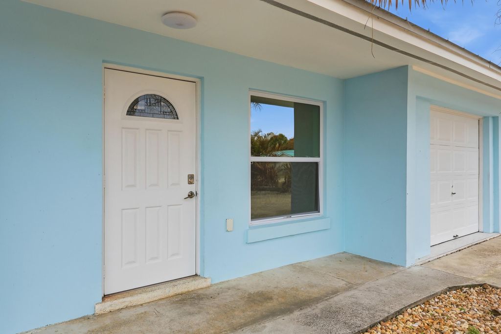 Photo of 1612 NE South Street, Jensen Beach, FL 34957 (MLS # R11163262)