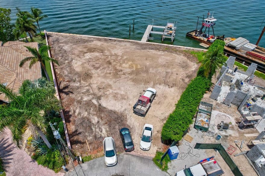 The crown jewel of Singer Island! This point lot hidden away in Palm Beach Isles offers the most spectacular waterway and sunset views overlooking wide Intracoastal waters with 200 feet of water frontage! Minutes to the ocean with direct access to the Palm Beach Inlet. Build your custom dream home or consider the incredible residence planned to be completed end of 2024 which will boast 8,490 square feet under air and 12,000 square feet total, upper and lower primary suites, club room, exercise room, media room, wine storage, boat storage and all the smart home capabilities! Custom dock designs are being drafted now to accommodate extremely large vessels. Call for more details.