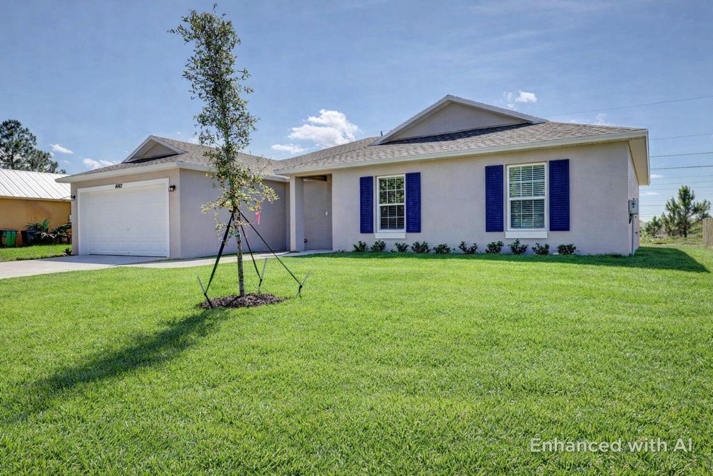 Photo of 5181 NW Mayfield Lane, Port Saint Lucie, FL 34983 (MLS # B26021550)