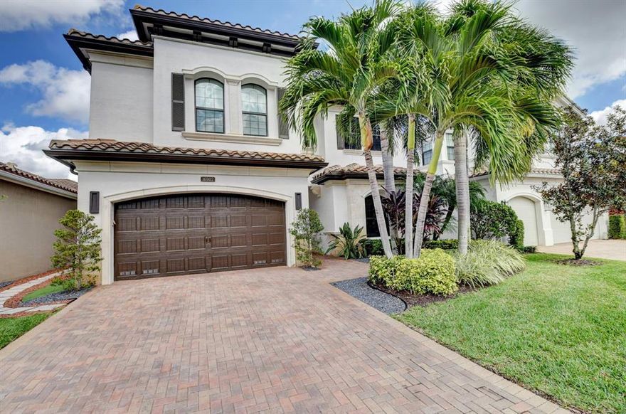 Welcome to The Bridges. This stunning Somerset Model has custom designer finishes throughout. The living room has a custom 18 ft. porcelain tile electric fireplace. The wet bar has mirrored glass tile, wine refrigerator striking upper custom cabinet w/glass shelves. The formal dining room with custom LED chandelier. The staircase with glass panels and wood railings with wood stairs and LED chandelier. The downstairs has 24X24 mud set porcelain tile & engineered wood flooring throughout the 2nd story The home boasts the builders model kitchen with quartz countertops, two ovens & European frameless cabinets with soft close and pull outs, stainless steel kitchen aid appliances. The primary bedroom has a stunning view of the lake. Primary bath has jetted tub, frameless shower door, custom framed mirrors and a stone wall. Custom fitted dressing room, remote controlled shades. The exterior of the home was painted in March 2022 and interior in April 2021. This one will not last. Furnishings are negotiable. LED lighting throughout. Owner/Agent