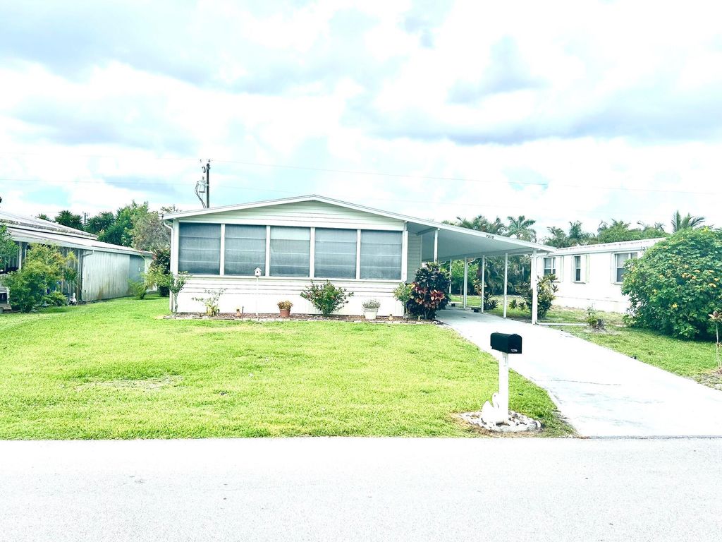 Photo of 7370 SE Eagle Avenue, Hobe Sound, FL 33455 (MLS # R10995438)