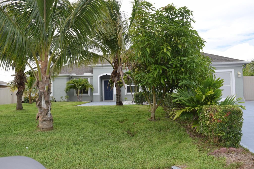 Photo of 901 SW Haleyberry Avenue, Port Saint Lucie, FL 34953 (MLS # R11105768)