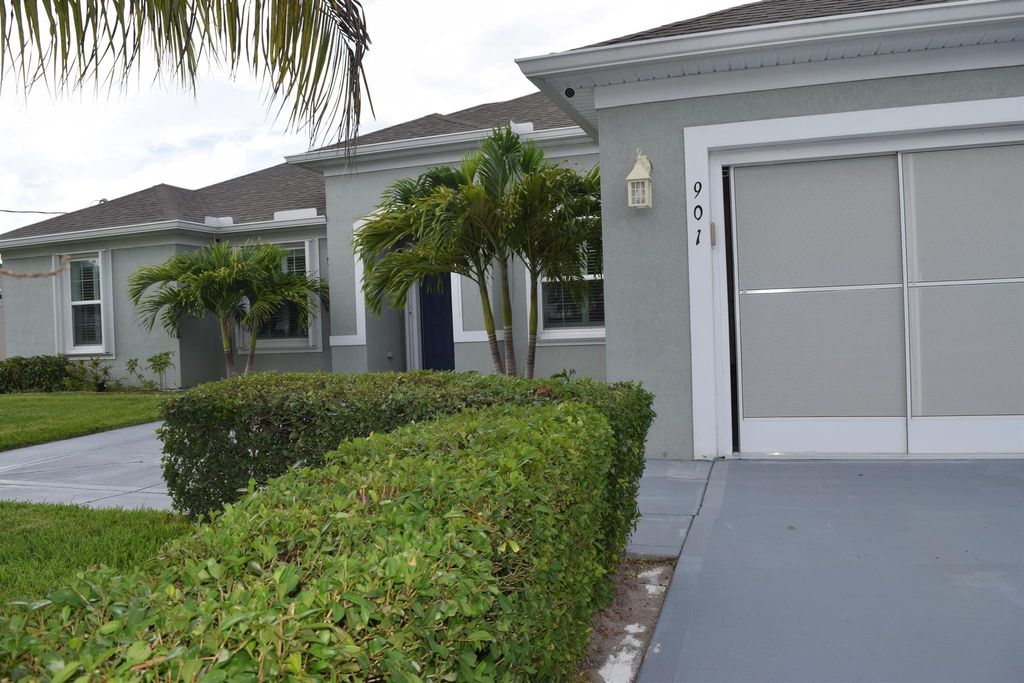 Photo of 901 SW Haleyberry Avenue, Port Saint Lucie, FL 34953 (MLS # R11105768)