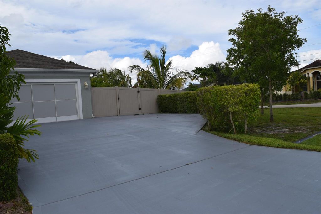 Photo of 901 SW Haleyberry Avenue, Port Saint Lucie, FL 34953 (MLS # R11105768)